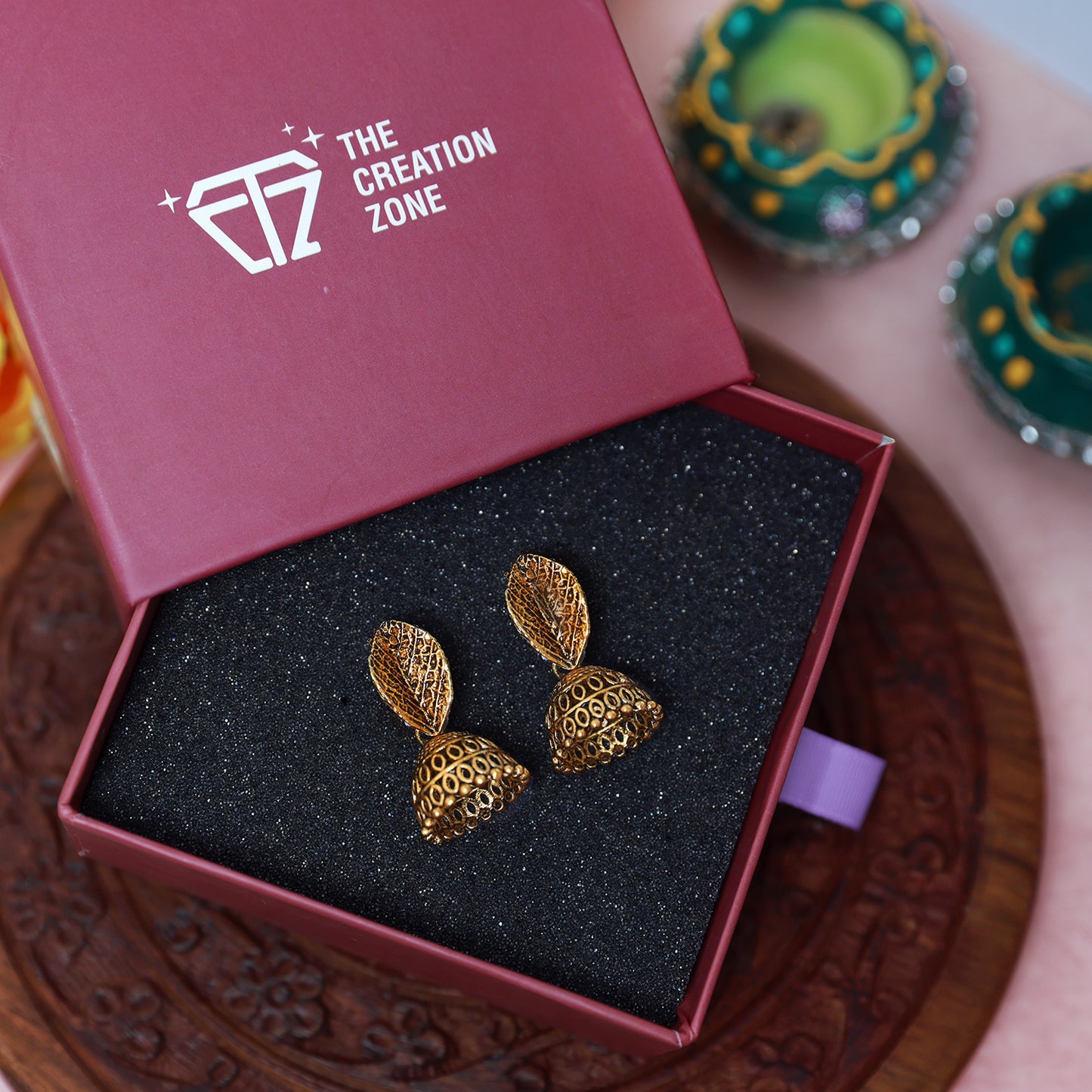 Antique Gold Jhumki Earrings with Intricate Filigree Design