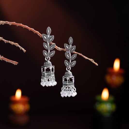 Silver Jhumka Earrings with Leaf Motifs and Pearl Dangles